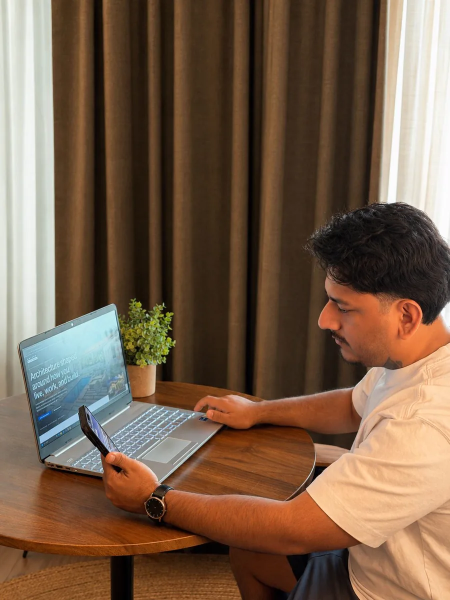 A page checked side by side on a laptop and a phone