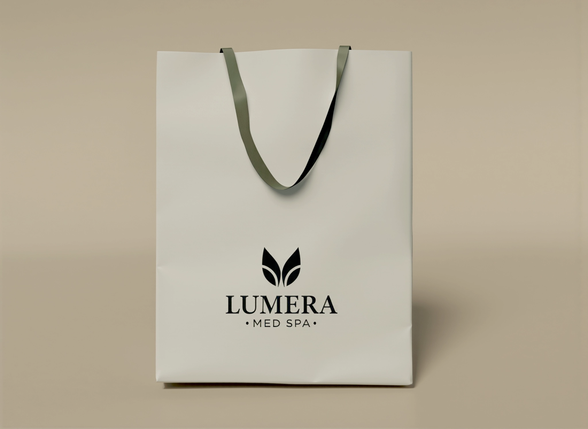 Custom-branded Lumera shopping bag with black logo and green handle