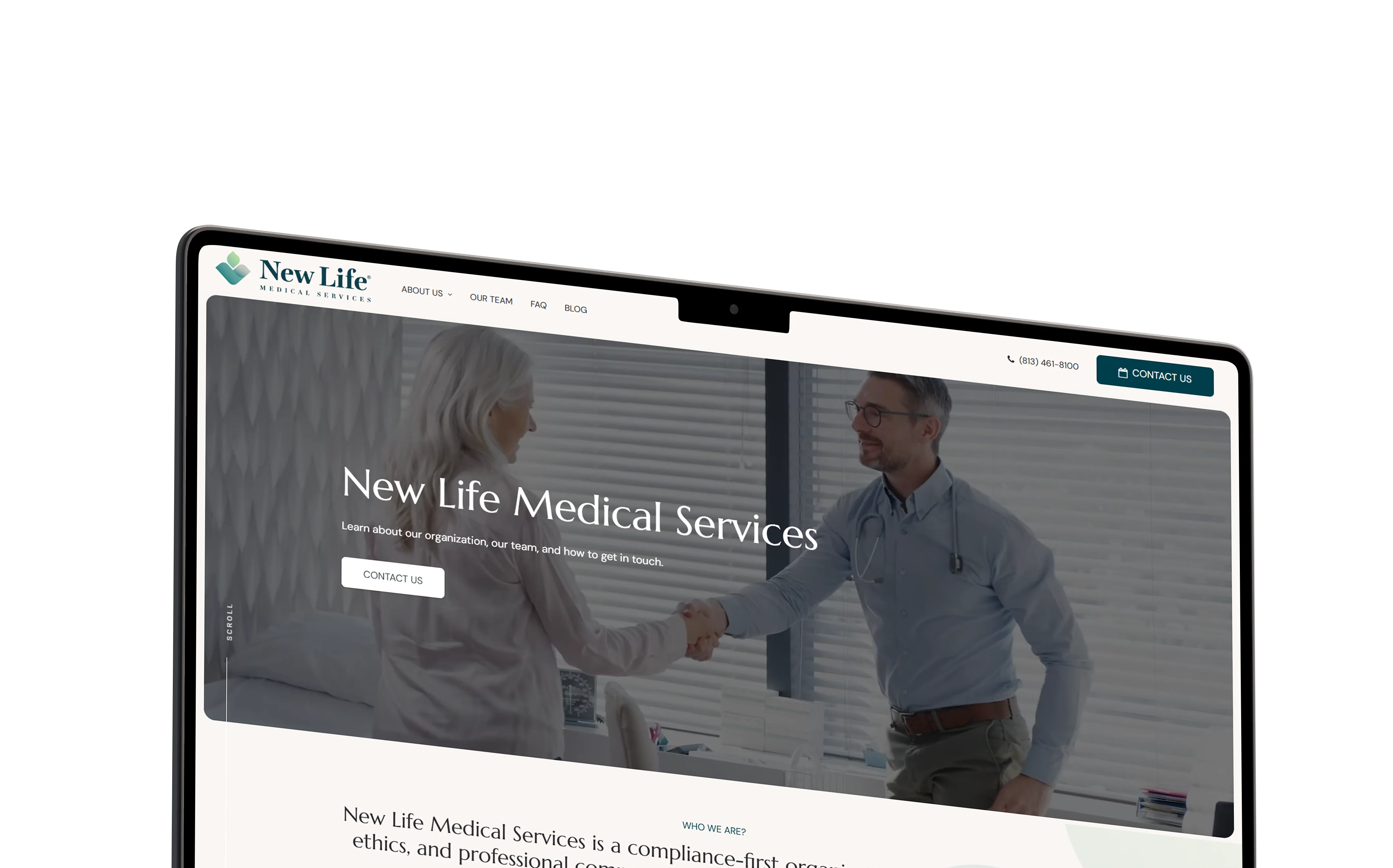 Angled laptop showing the New Life Medical Services website with a medical services hero section