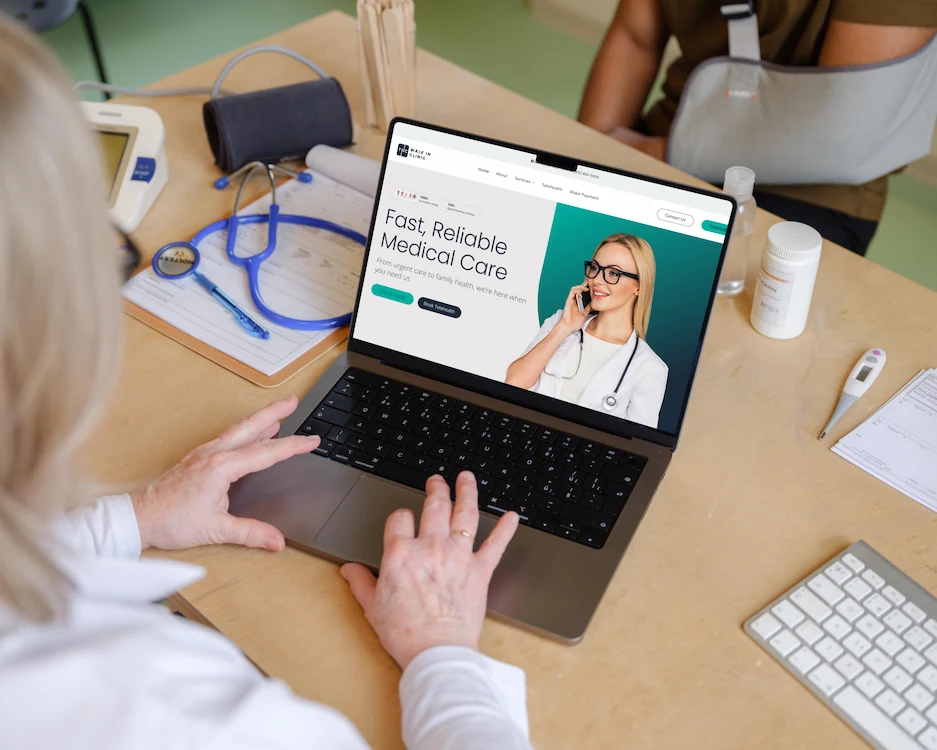 A clinician at a desk with a laptop showing the TNC Walk In Clinic site headlined Fast, Reliable Medical Care