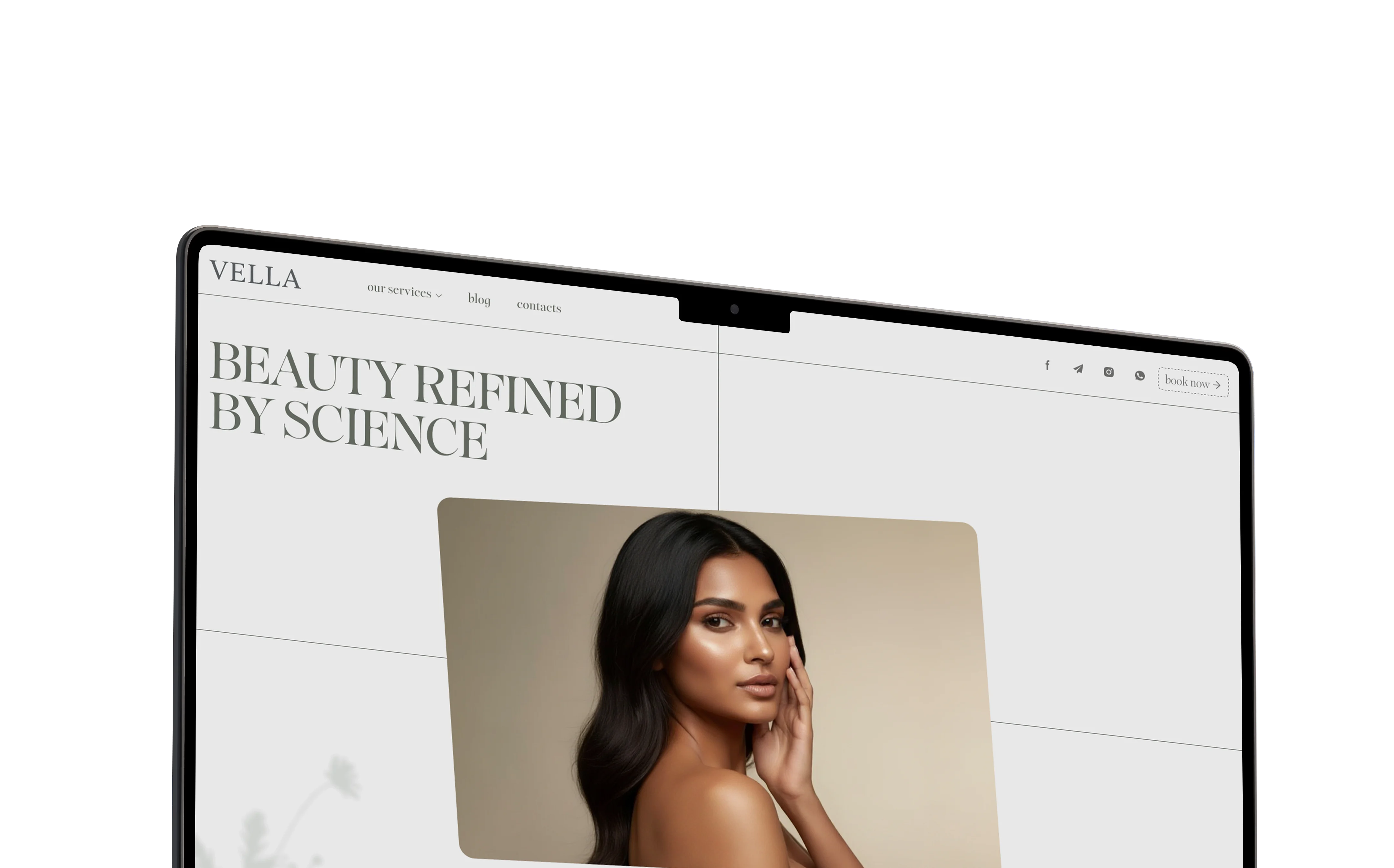 Angled laptop showing the Vella Med Spa website concept with beauty and skincare imagery